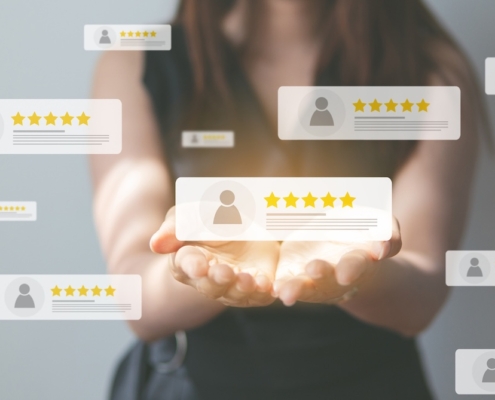 Business people using smartphone and pressing review popup on visual screen, customer review by five star feedback, positive customer feedback testimonial.