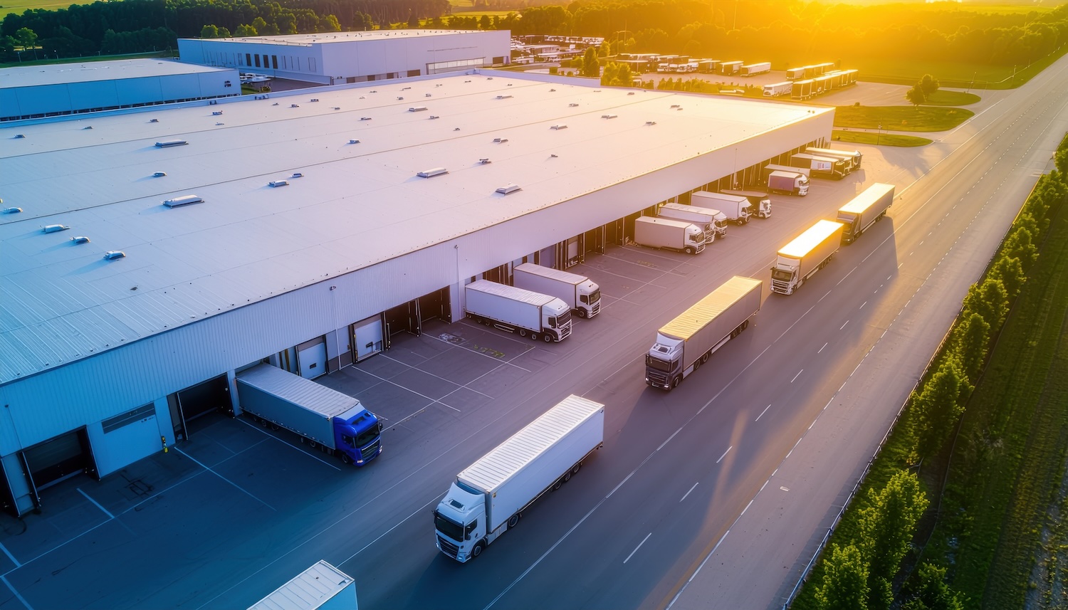 trucks at a distribution center aerial view